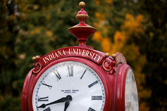 Close up of an IU red clock on a fall day.